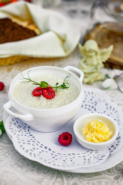 breakfast, rice porridge with butter, fruits and berries