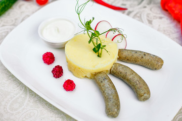 mashed potatoes with sausages for lunch