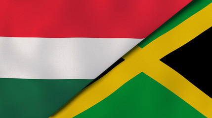 The flags of Hungary and Jamaica. News, reportage, business background. 3d illustration