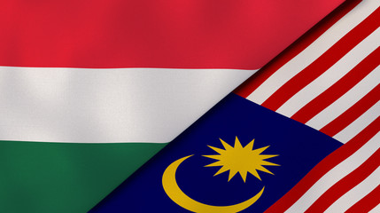 The flags of Hungary and Malaysia. News, reportage, business background. 3d illustration
