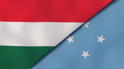 The flags of Hungary and Micronesia. News, reportage, business background. 3d illustration