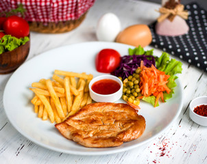 fried chicken fillet fries and salad