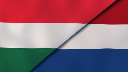 The flags of Hungary and Netherlands. News, reportage, business background. 3d illustration