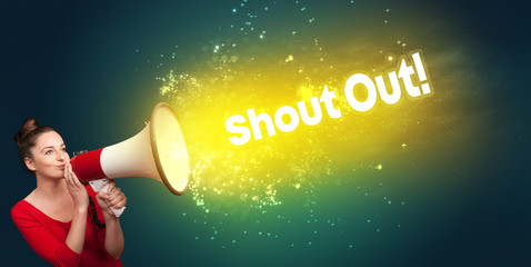 Young woman yelling to loudspeaker with Shout Out! inscription, modern media concept