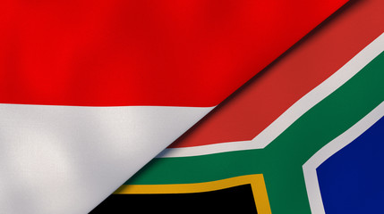 The flags of Indonesia and South Africa. News, reportage, business background. 3d illustration