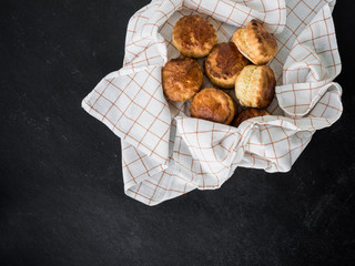 Freshly baked homemade scones. slate background