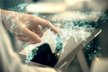 Double exposure of man's hands holding and using a phone and social network theme drawing.