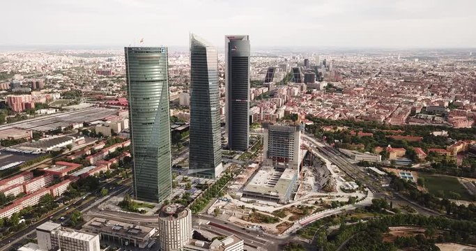MADRID, SPAIN - JUNE 16, 2019: High view of four modern business skyscrapers (Cuatro Torres) in Madrid, Spain