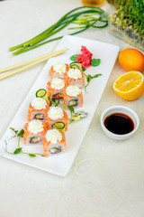 Sushi Philadelphia with soy sauce and chopsticks