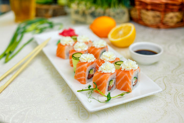 Sushi Philadelphia with soy sauce and chopsticks