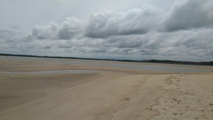 sand dunes and clouds