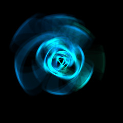 Spinning rays of light isolated on black background. Graphic 2D illustration of glowing colorful light particles in circular motion.