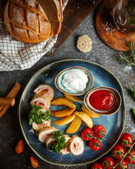 ham rolls with potatoes and ketchup