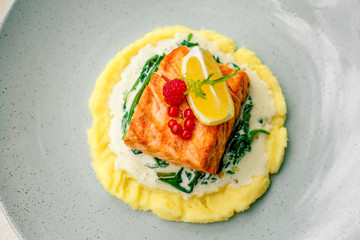 fried fish with mashed potatoes and cream sauce