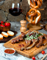 kebab set with adjika and glass of wine