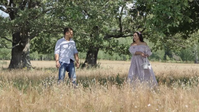 The girl in the Meadow under the Oak tree Sings a Song Guy
