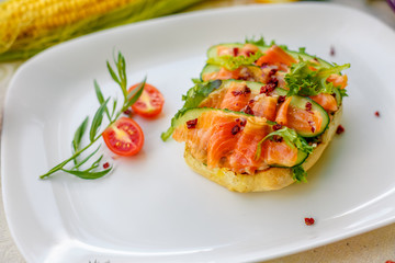 sandwich with bread fish and cucumber