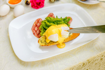 breakfast with garlic cheese bread, with egg salad leaves and bacon