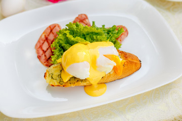 breakfast with garlic cheese bread, with egg salad leaves and bacon
