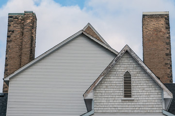 angles of several roof tops and chimneys