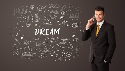 Businessman thinking with DREAM inscription, business education concept