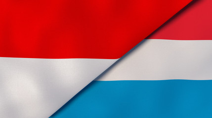 The flags of Indonesia and Luxembourg. News, reportage, business background. 3d illustration