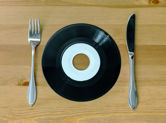 Vinyl record with knife and fork