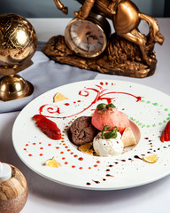 mixed ice cream with sliced strawberries