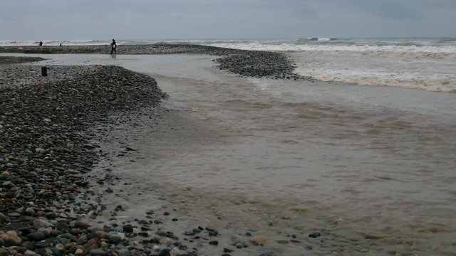 River Flowing Into The Sea