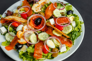 salad with fresh fish arugula and cheese