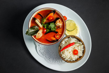 Thai spicy tom yam soup with seafood