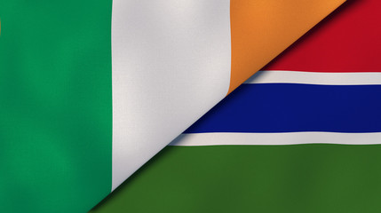 The flags of Ireland and Gambia. News, reportage, business background. 3d illustration