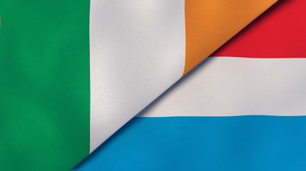 The flags of Ireland and Luxembourg. News, reportage, business background. 3d illustration