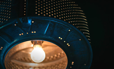 Obraz premium The lamp from the drum of the washing machine
