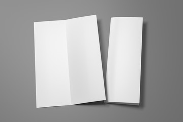 Blank vertical A4 leaflet on gray background. Bi-fold or half-fold opened and folded brochure isolated with clipping path. Side view. 3d illustration