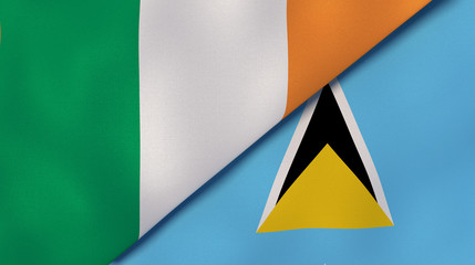 The flags of Ireland and Saint Lucia. News, reportage, business background. 3d illustration