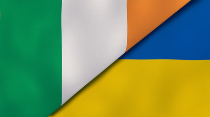 The flags of Ireland and Ukraine. News, reportage, business background. 3d illustration