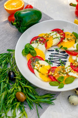 fresh vegetarian salad with greens and vegetables on the table, healthy food