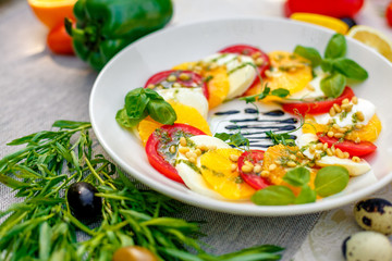 fresh vegetarian salad with greens and vegetables on the table, healthy food