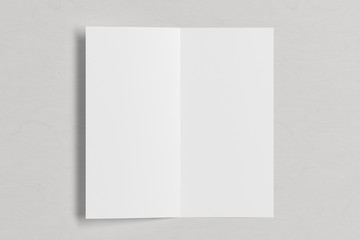 Blank square leaflet on white wooden background. Bi-fold or half-fold opened brochure isolated with clipping path. View directly above. 3d illustration