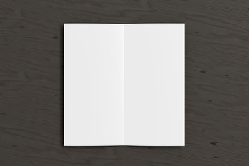 Blank square leaflet on black wooden background. Bi-fold or half-fold opened brochure isolated with clipping path. View directly above. 3d illustration