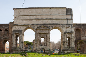 Fototapeta na wymiar The Porta Maggiore (Larger Gate), or Porta Prenestina, is one of the eastern gates in Aurelian Walls of Rome, Italy.