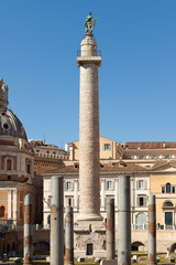 Fototapeta na wymiar Trajan Column (Colonna Traiana). Roman triumphal column in Rome, Italy. View from Trajan forum.