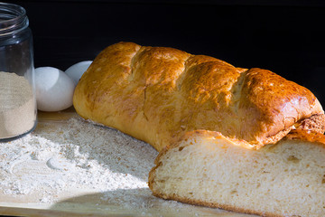 Homemade bread with whole flour, butter, milk and eggs and sliced ​​honey