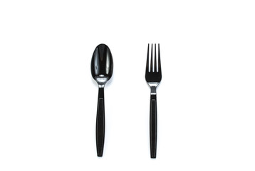 black plastic spoon and fork isolated on white background