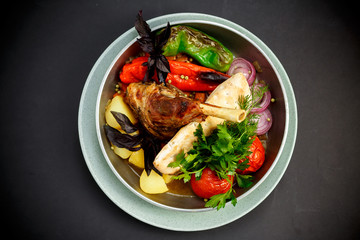 delicious baked leg of lamb with grilled vegetables
