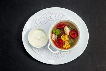 children's colored dumplings, dough made from beets, spinach and carrots by hand kneading and meat beef filling