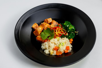 roast chicken fillet in Japanese sake-based sauce, white rice fried with spices, juicy vegetables with broccoli
