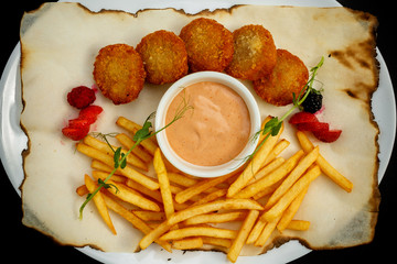 delicious nuggets with crispy fries and ketchup