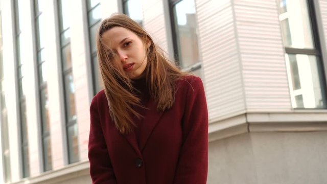 Beautiful girl on windy day outdoor